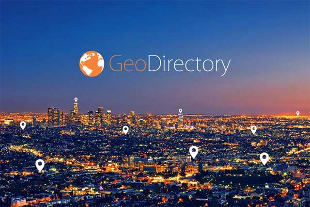 GeoDirectory wordmark over a city skyline at dusk with map pin markers