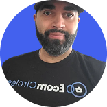 Bearded man in a black cap and Ecom Circles t-shirt on a blue circle.